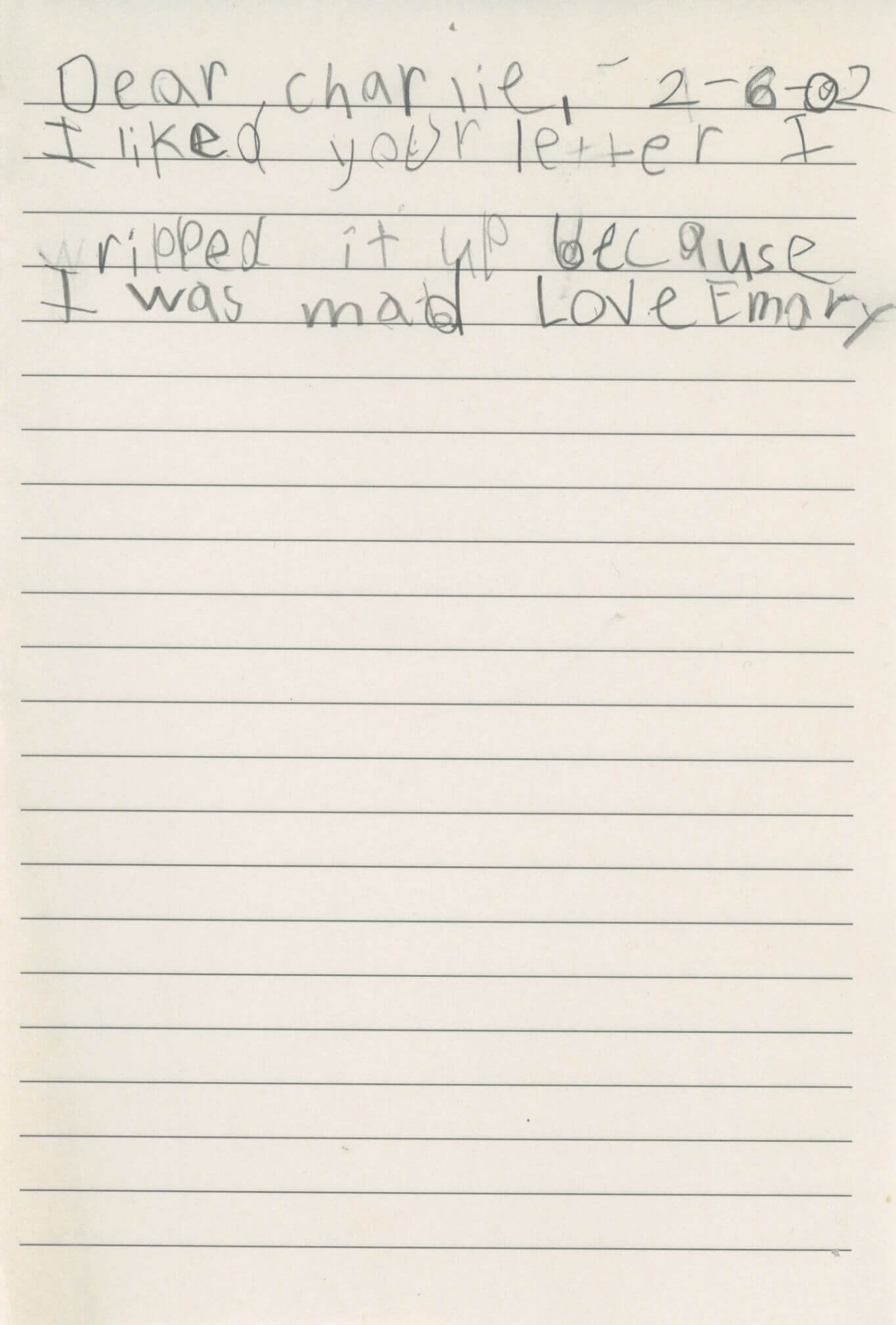 A handwritten note: '2/6/02 Dear Charlie, I liked your letter I ripped it up because I was mad. Love Emary.'